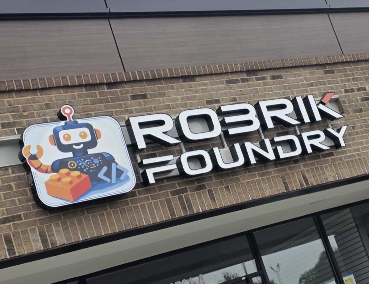 The Robrik Foundry storefront sign
